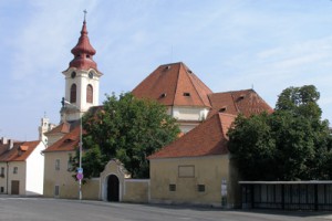 Parish house and Church in Postoloprty